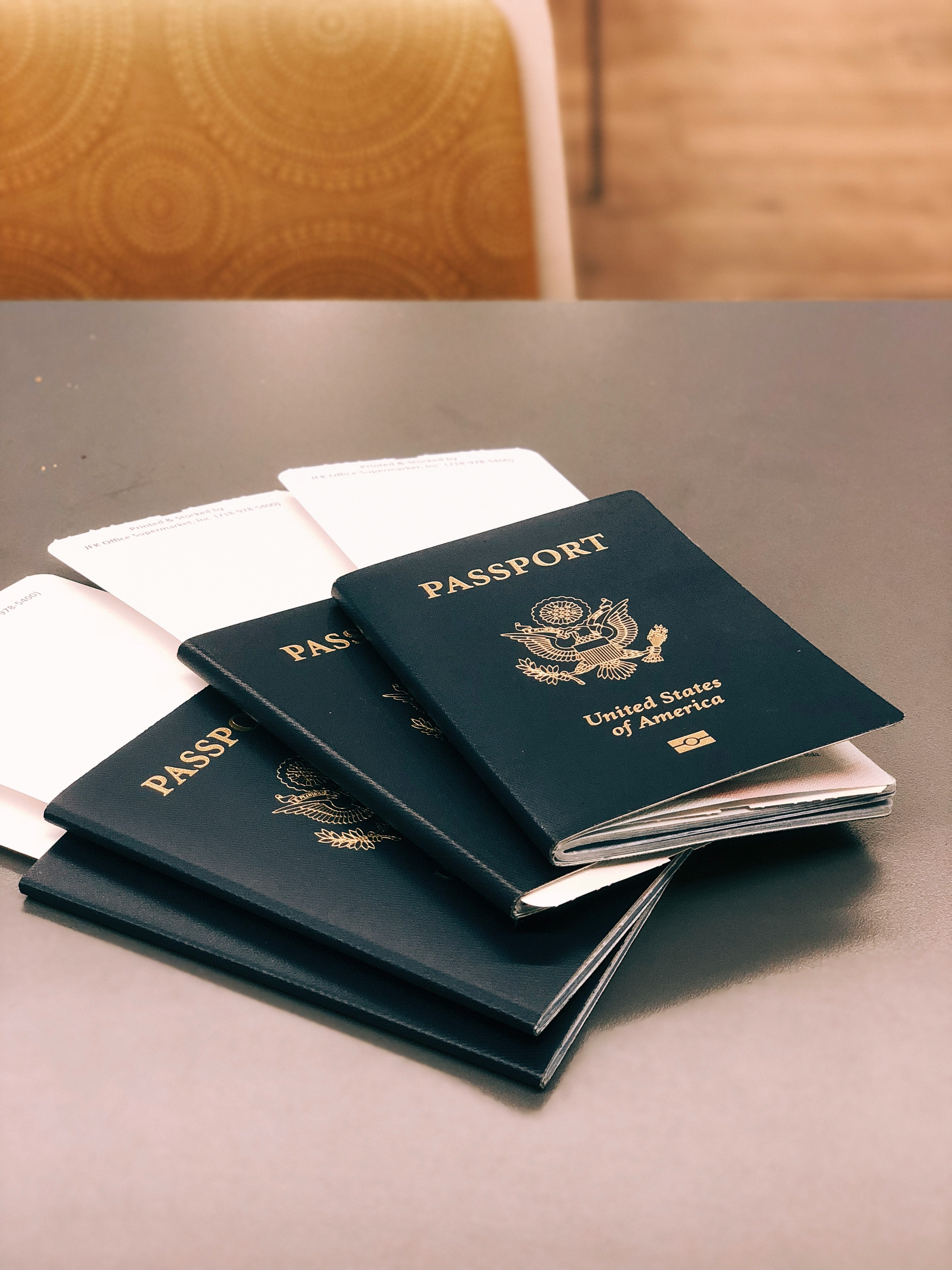 four green Passports